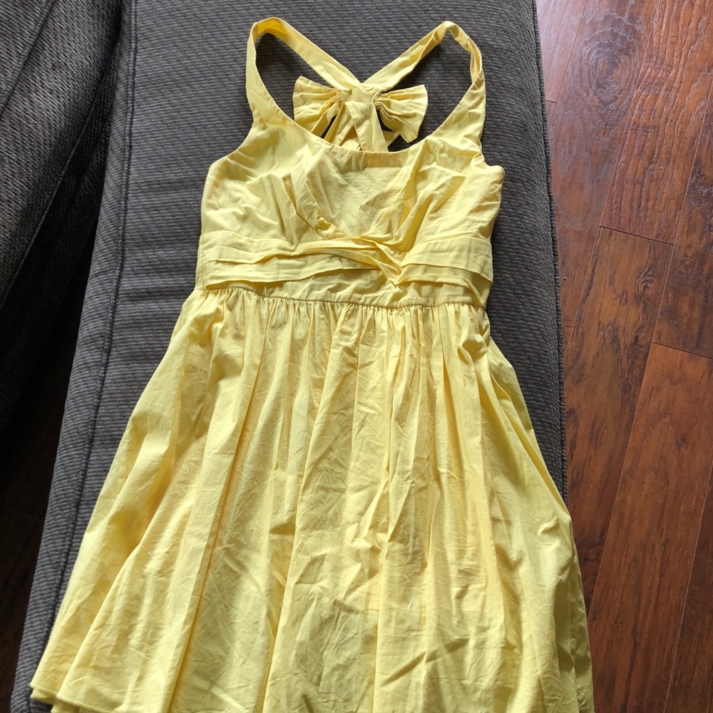 Adorable yellow dress with bow detail
